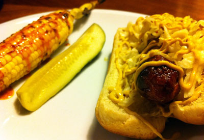Kraut dog, pickle and Honey-Chipotle Grilled Corn